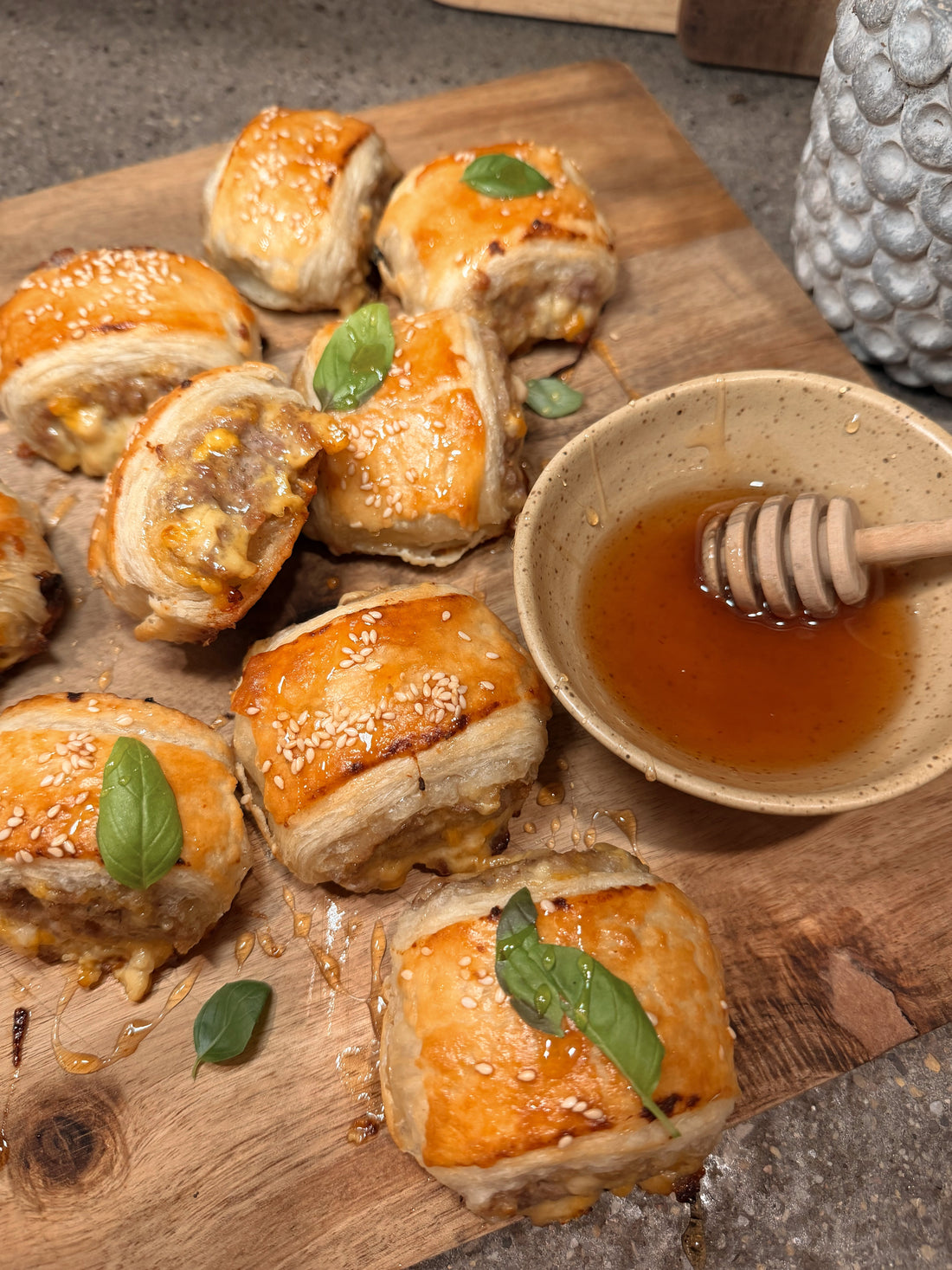 Hot honey sausage rolls